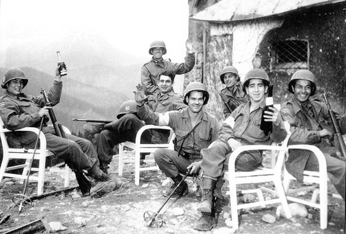 The 7th Infantry Regiment attached to the 3rd Infantry Division drink Hitler's wine on the patio of the Berghof, below the Eagle's Nest (Probable Source: Yank Magazine)