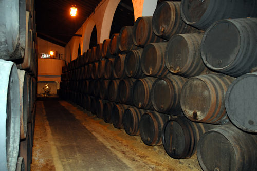 Sherry barrels in a cellar in Jerez de la frontera, Spain