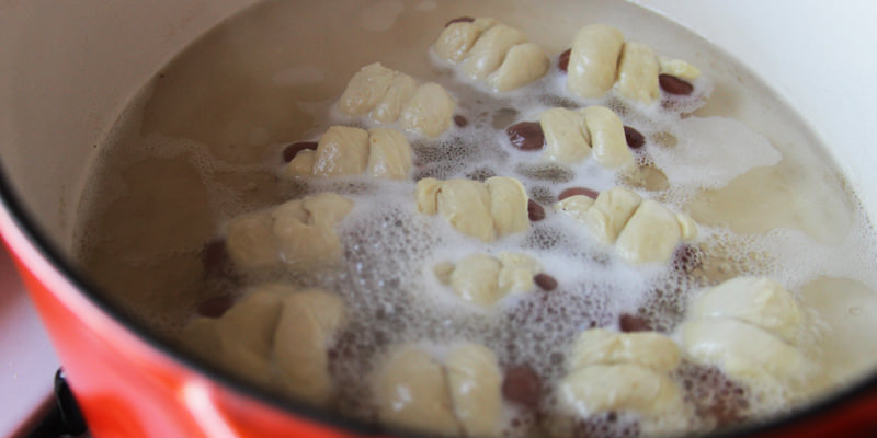 Boiling those pretzel piggies!