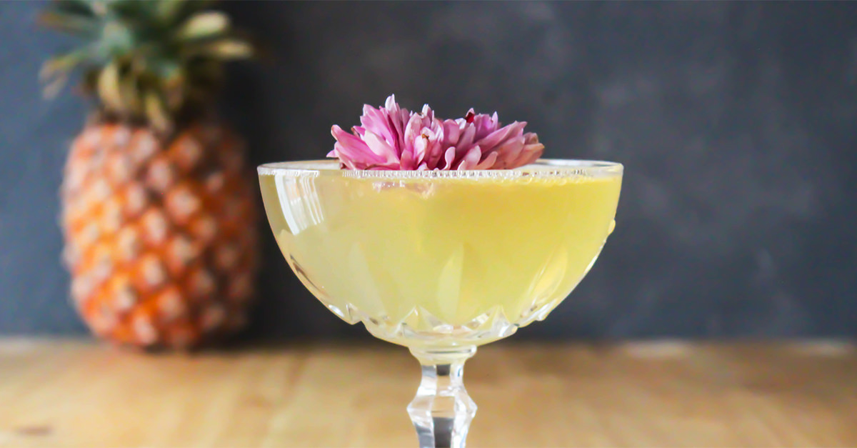 This Sparkling Purple Pineapple is a sparkling wine cocktail to make year-round