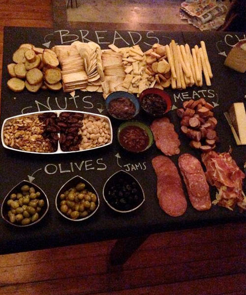 We're Obsessed With These 15 Swoon-Worthy Cheese & Charcuterie Boards Chalkboard Cheeseboard DIY Crackers Nuts Meats Breadsticks Olives Jams
