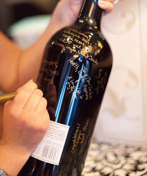 Use a wine bottle as your wedding guest book