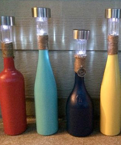 9 Adorable Garden Crafts to Make With Wine Bottles DIY wine bottle solar lanterns