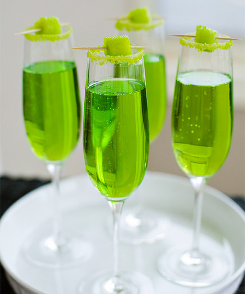 Sparkling Shamrock cocktail for St. Patrick's Day cocktail party with champagne and midori