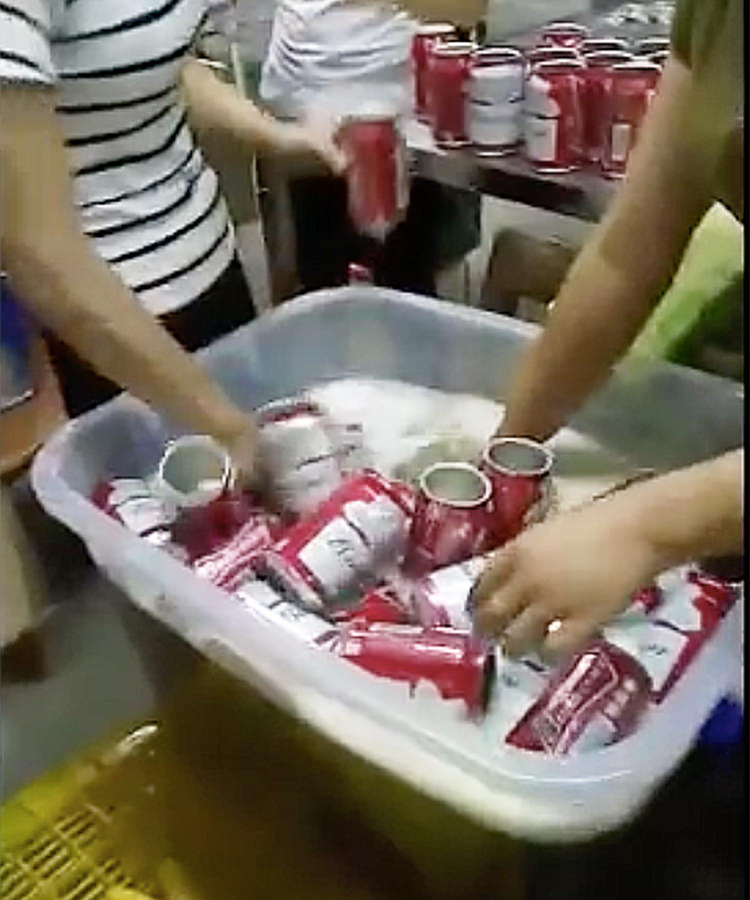 Watch Chinese Forgers Make Counterfeit Budweiser