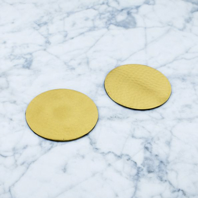 These handmade brass coasters are the perfect addition to your Mother's Day gift basket.