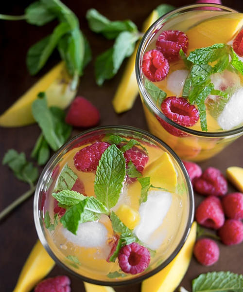 This raspberry mango sangria is perfect for the summer season