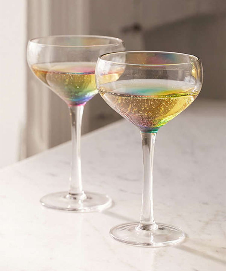 These One of a Kind Coupe Glasses Turn All of Your Drinks Into Rainbows