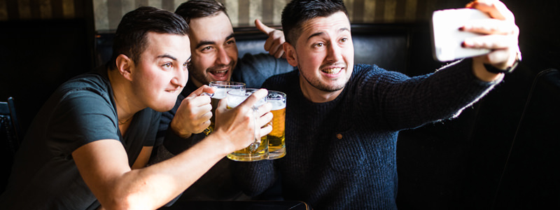 Man show beer drinker