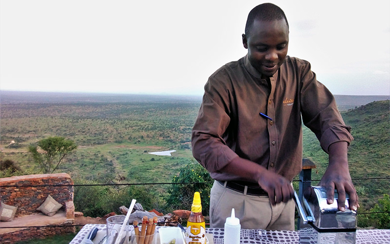 Bartender Royford Mwongera fixes a Dawa at Loisaba.
