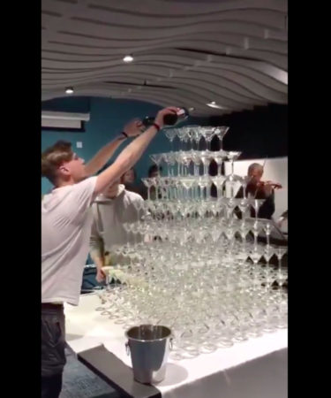 Unlucky Man Shows How Not to Pour a Champagne Tower
