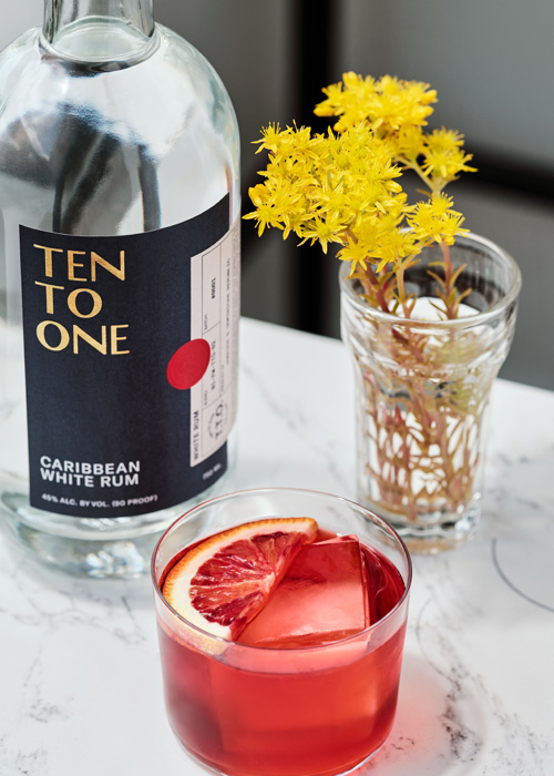 Ten to One is a Black-owned spirits brand, and the The Blood Orange Negroni recipe is made with Ten to One White Rum.