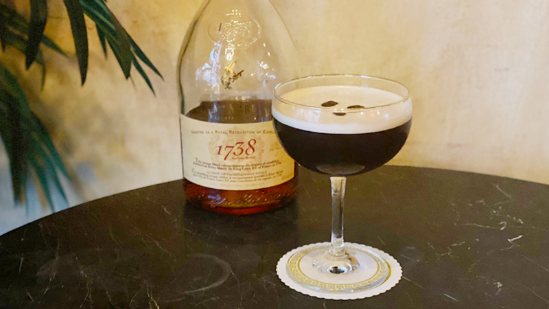 Lauran Newman's Espresso Martini, garnished with three coffee beans.