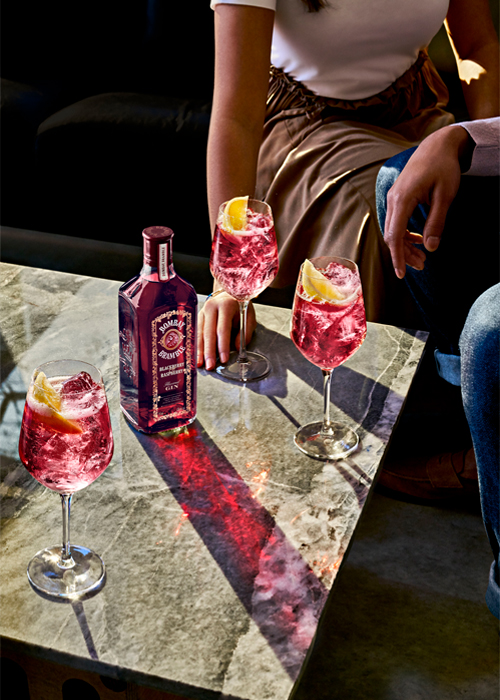 To mix your own Bombay Bramble & Tonic, combine one and a half ounces Bombay Bramble with four ounces of tonic water over ice. Squeeze a lemon into the drink and serve in your favorite balloon or wine glass.