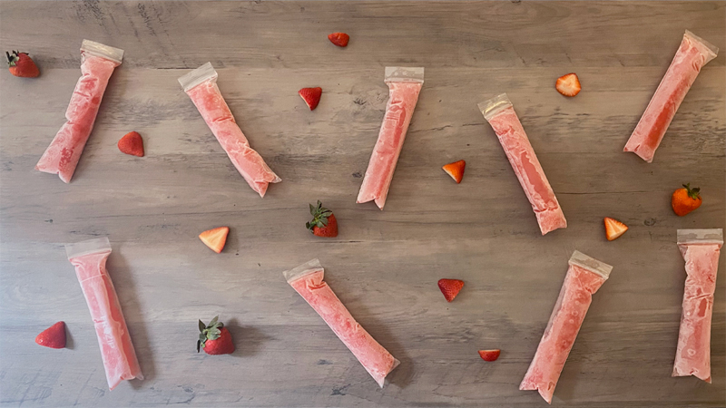 Rosé ice pops are made with rosé, strawberries, and sweetener