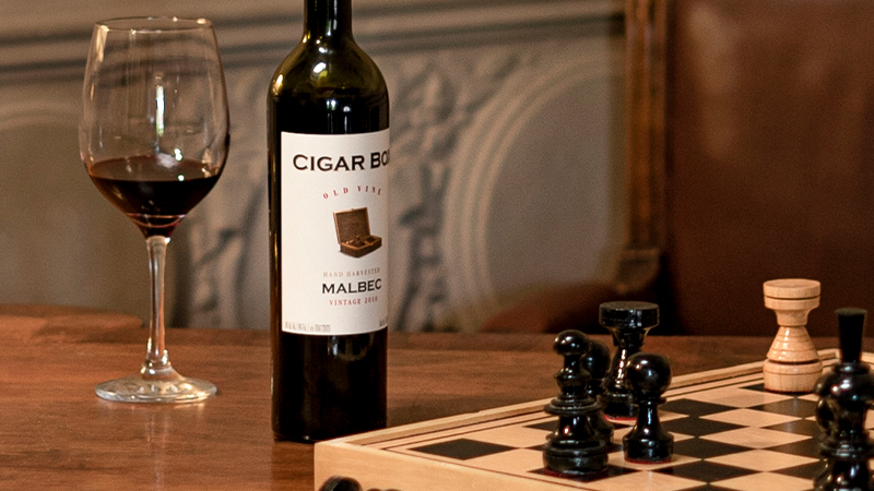 The Cigar Box Old Vine Malbec conveys complex aromas of red fruit jam, spices, vanilla, and a delicate smokiness.