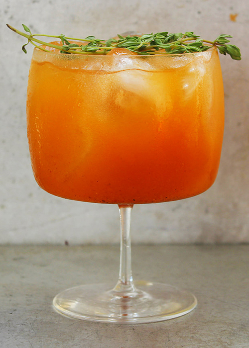 Thyme-Infused Pumpkin Treat Recipe is one of the Best Cocktail Recipes for Thanksgiving.