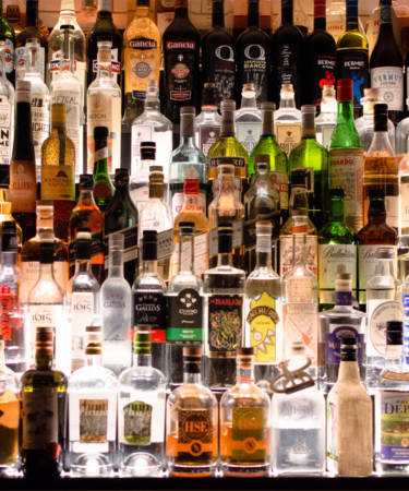 12 Bottles Every Home Bar Needs [Infographic]