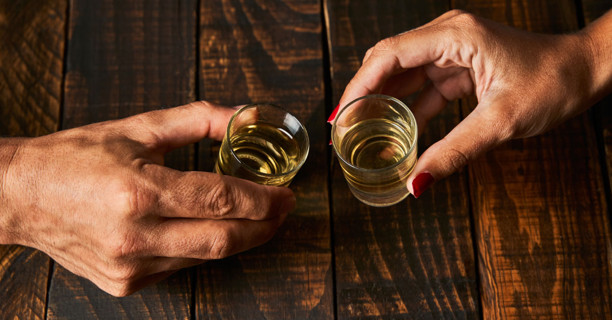 tapping a shot glass on the bar