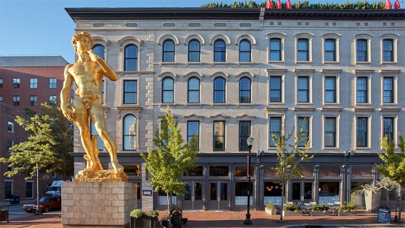 The 30-foot-tall gold statue of Michaelangelo’s David stands outside one of the early gambles, the first 21C Museum Hotel (now one of 11 nationwide properties).