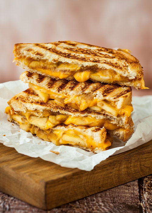 the classic grilled cheese is elevated with shallots caramelized with dry vermouth