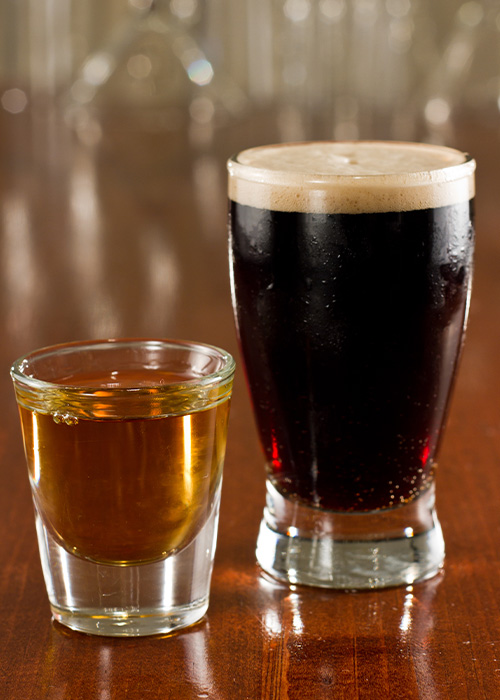 A beer and a shot are great drinks to order at a dive bar that's not a vodka soda.