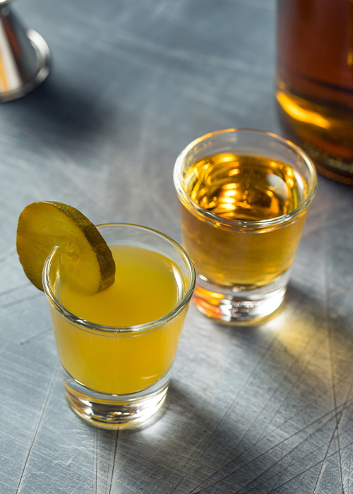 Pickleback shots are a great drink to order at a dive bar that isn't a vodka soda.