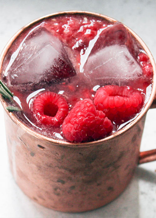The Raspberry Rum mule uses rum in place of vodka and adds raspberries for a fruity twist in this mule variation.