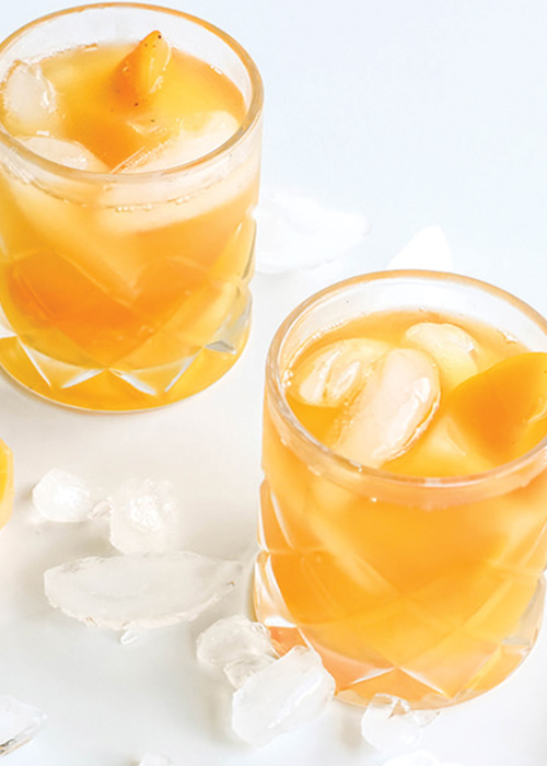 The Bourbon Peach Punch is one of the best summer bourbon cocktails.