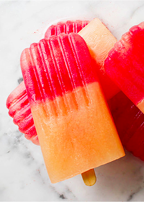 The Too-Tempting Melon Spiked Popsicles are one of the best vodka cocktails for Summer.
