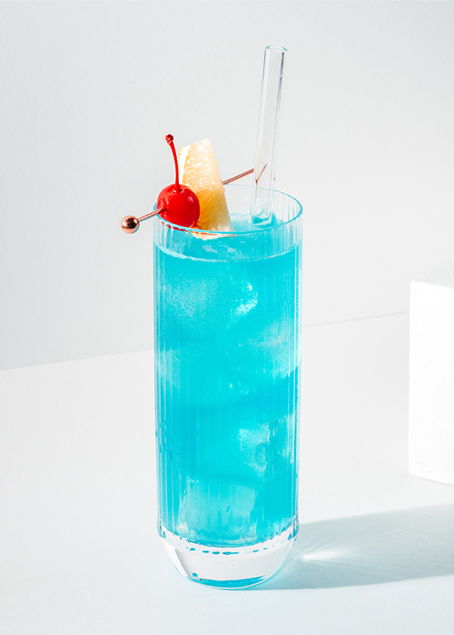 The Blue Long Island Iced Tea is a boozy Halloween cocktail to try this fall.