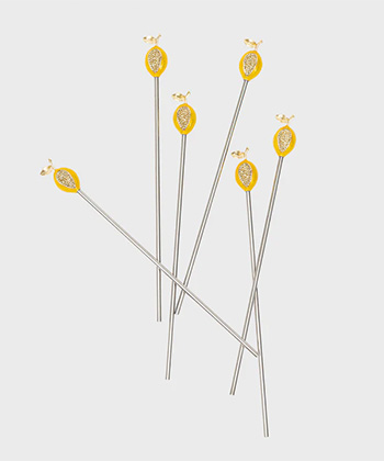 Joanna Buchanan Lemon Swizzle Sticks are one of the best gifts for cocktail lovers this holiday season.