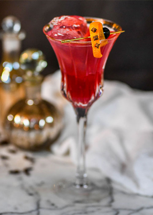 The Twisted Holiday Cosmo is one of the best Christmas cocktails to make in 2022.