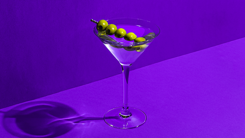 A Filthy Martini with five olives for garnish