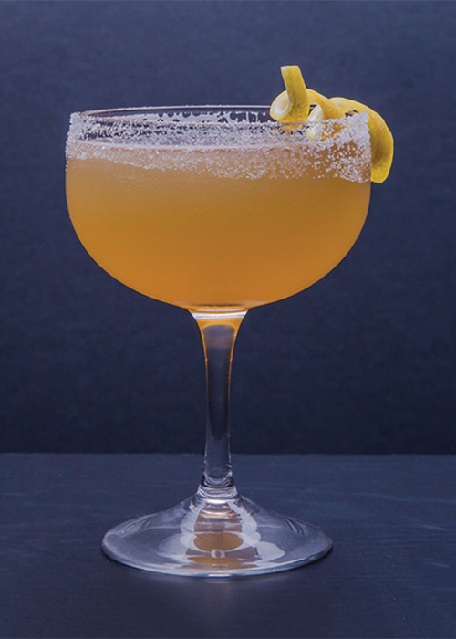 The Sidecar is a brandy cocktail with lemon twist garnish