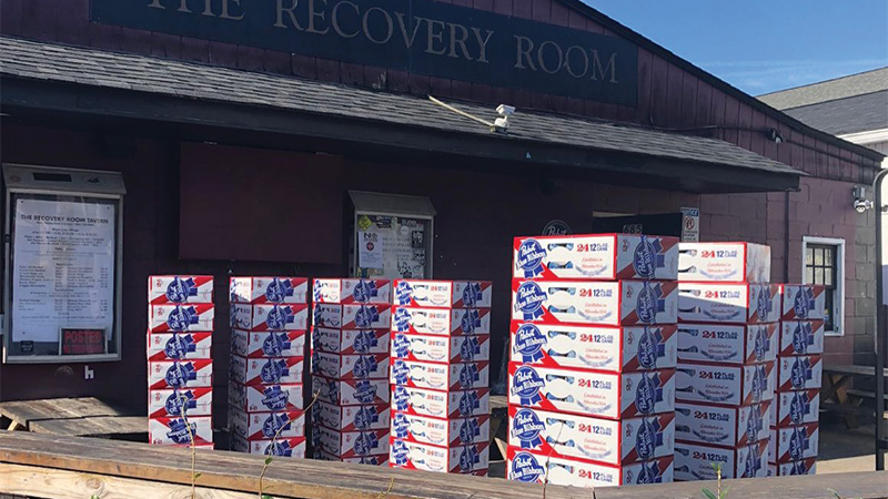 Flats of PBR lined up outside the Recovery Room