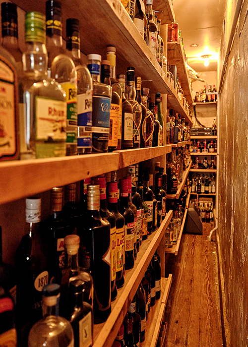The booze closet at Long Island Bar