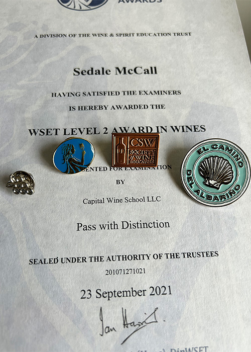 Sedale McCall's WSET Level 2 Certification with Distinction.