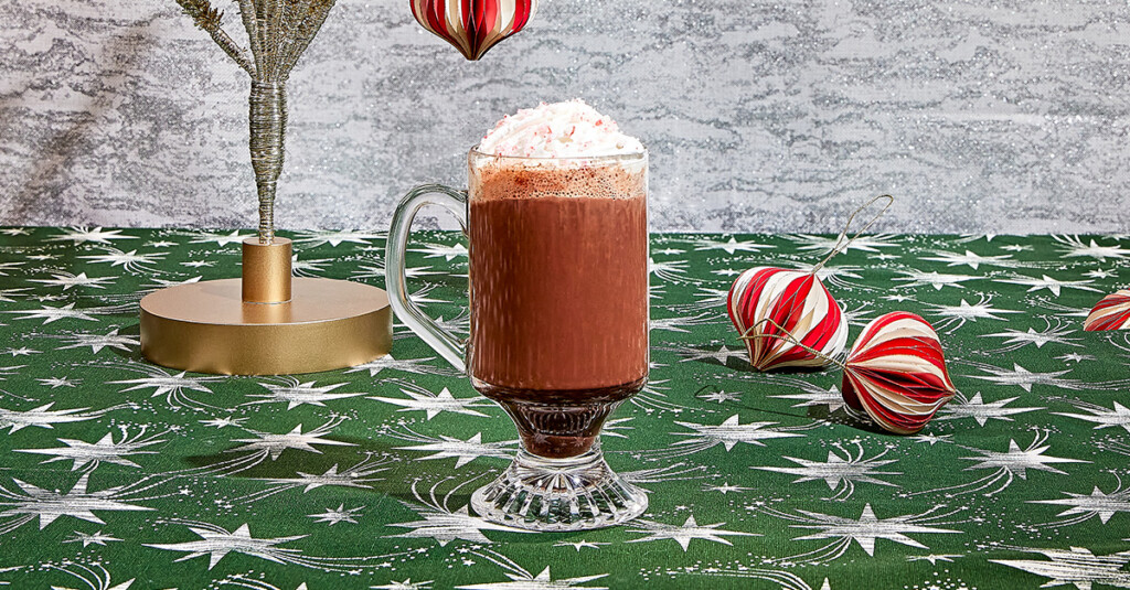 Upgrade your hot cocoa game with a festive take on hot chocolate. Featuring unsweetened cocoa powder, sugar, and real vanilla extract.