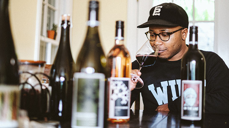 Reggie Wilson is utilizing custom crush grapes and fostering diversity in the wine industry. 
