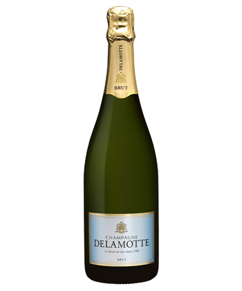 Champagne Delamotte Brut NV is one of the best bottles of Champagne to gift this holiday season. 