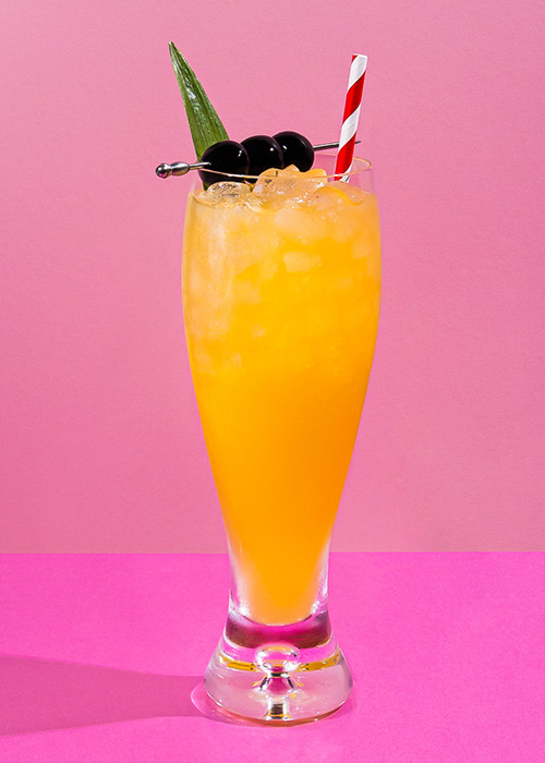 The Three Dots and a Dash is a rum cocktail that uses three types of rum instead of just one. 