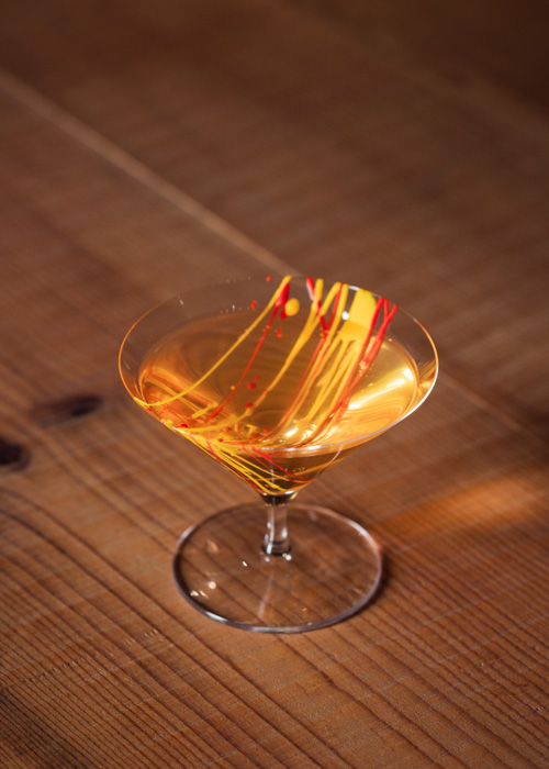 At Tokyo Confidential, there is a "Glizztini" on the menu, a drink including gin, shochu, mezcal, and Lillet Blanc, along with tomato pickle, MSG, and onion brine. 