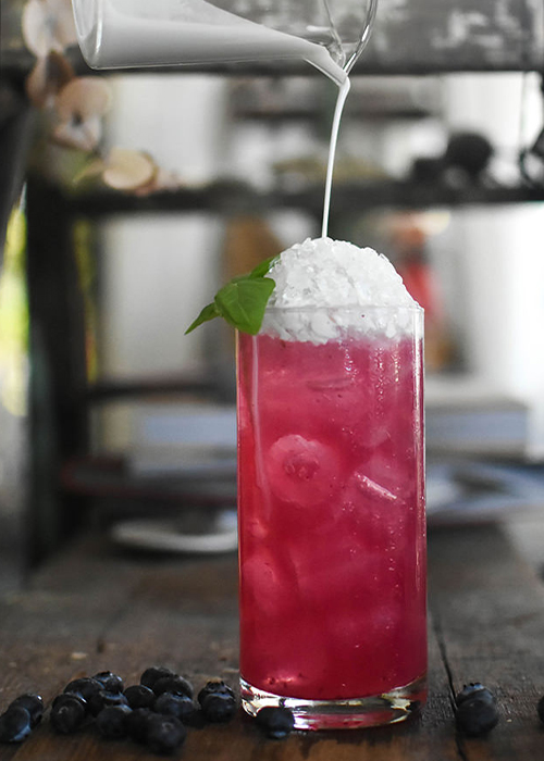The Berry-Mezcal Colada is one of the best cocktails to make with crème de cassis. 