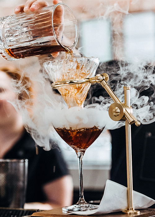 We're entering a new era where distillery tasting rooms are no longer mere sampling spots but destinations for world-class mixed drinks. Bardstown Bourbon is one such location.