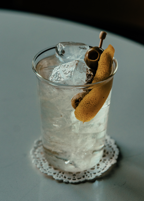 In the dog days of summer, even devoted Martini lovers might want something a bit more refreshing. Enter: the Dirty Martini and Tonic.