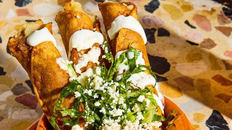 Superbueno's flautas de camarón y papa is one of the best bar snacks in New York City.