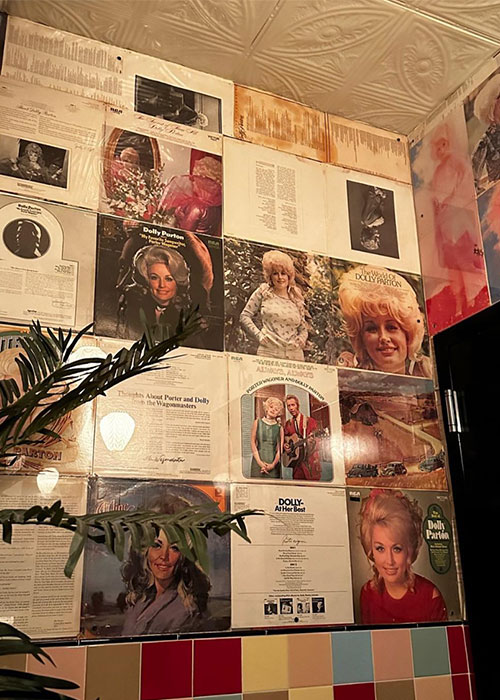 Dolly’s Swig & Dive has one of the best bar bathrooms in NYC.