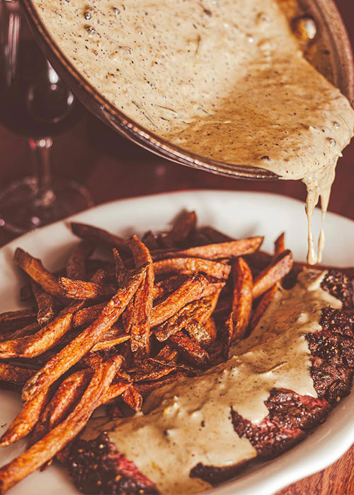 Liar Liar's steak frites is one of the best wine bar snacks in NYC.