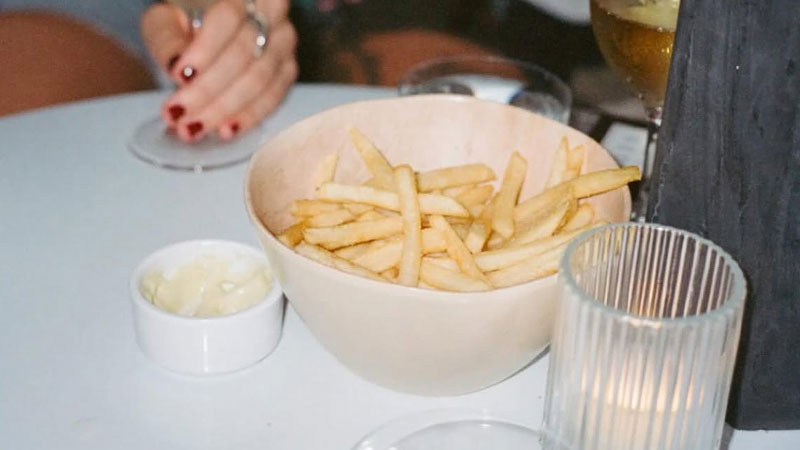 Plus de Vin's frites + aioli is one of the best wine bar snacks in NYC.